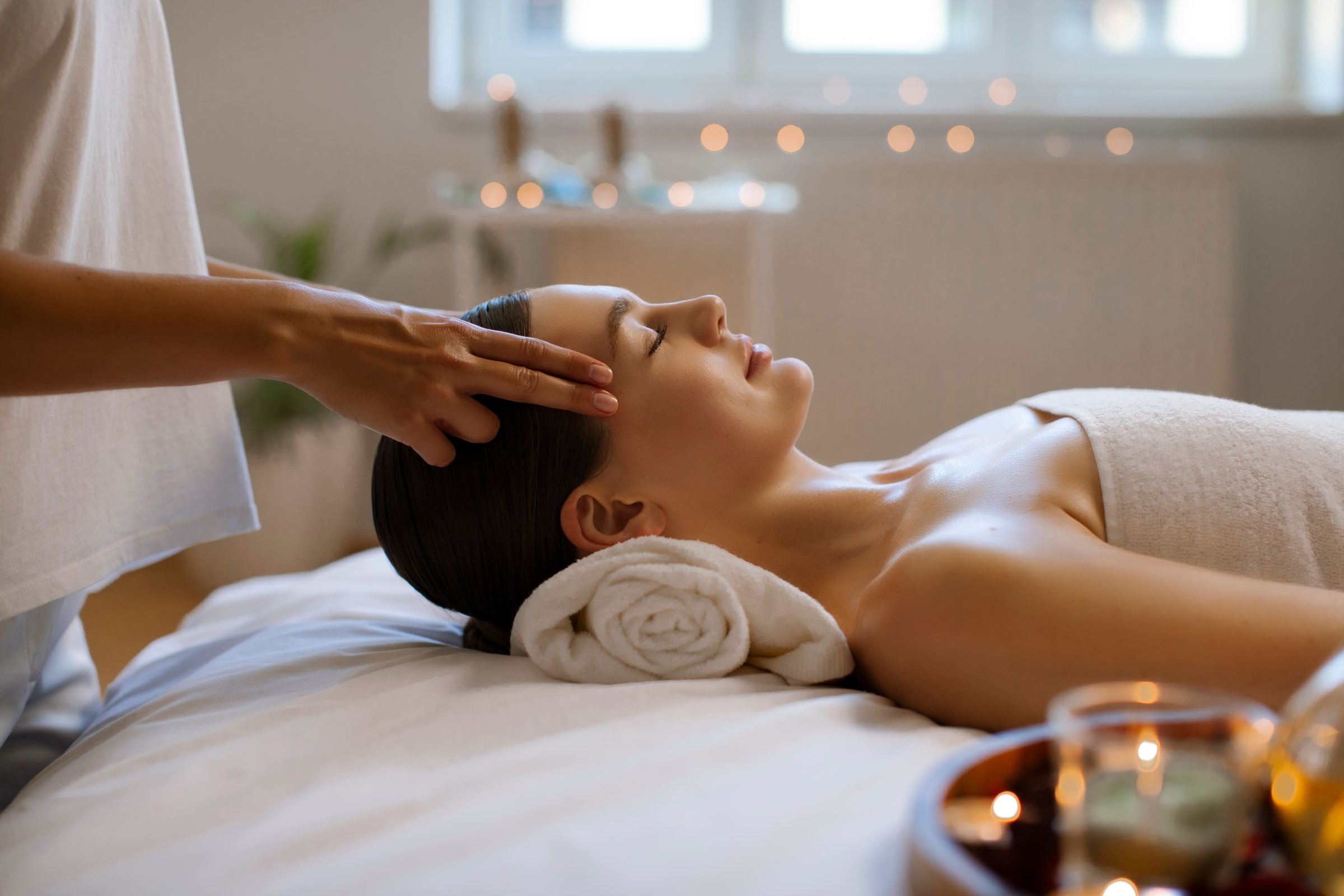 About Gentle head massage in a bright, calm spa room
