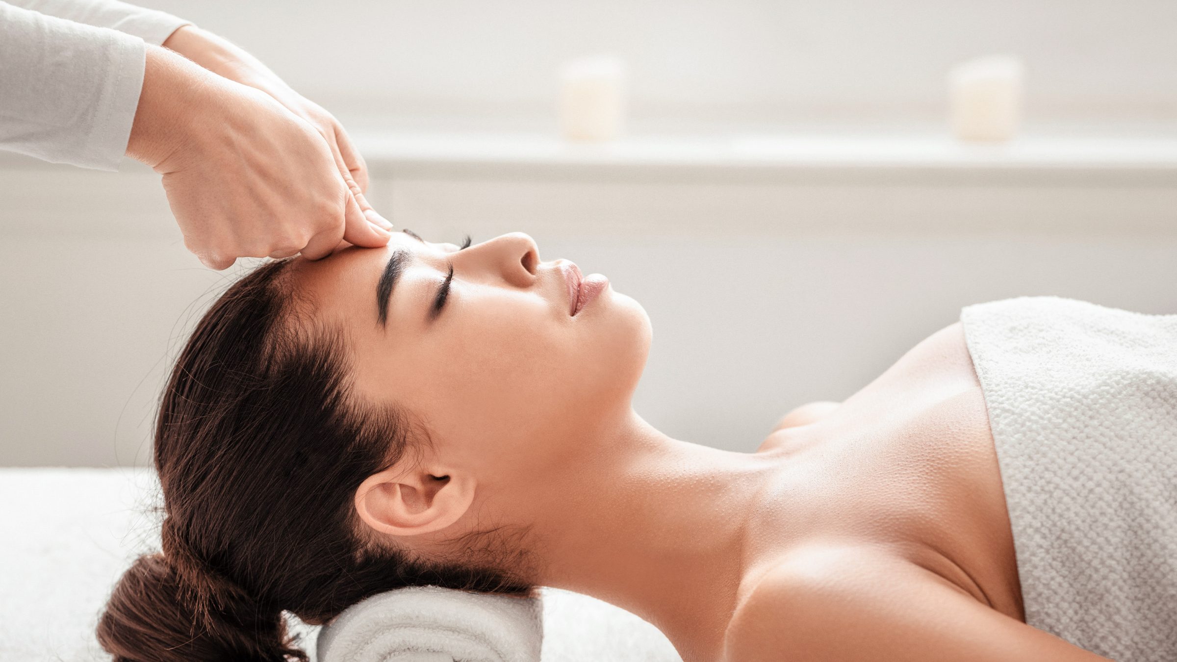 About Woman relaxing during a Chinese head massage
